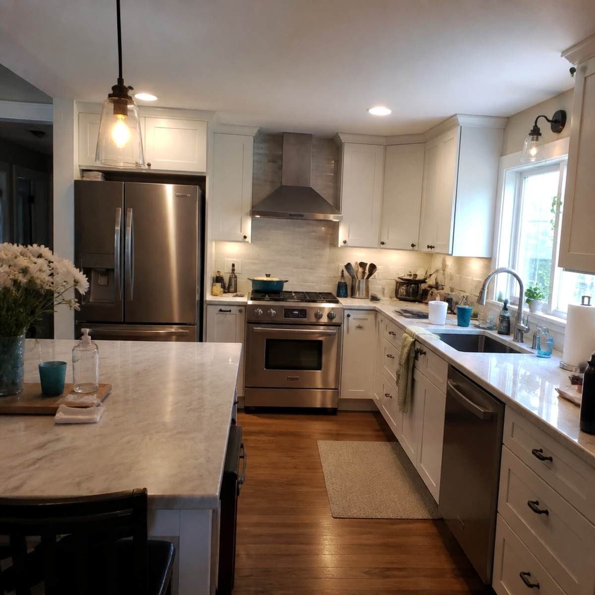 Kitchen and bath remodeling team reviewing plans in a renovated home